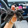 Nuevo Llavero Creativo de Camelia con Lazo Estilo Elegante Chanel Colgante Decorativo Coreano para Niñas