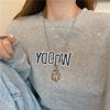 Collar de moda estilo hip hop para mujer, estilo frío, con diseño de nicho de circonita de color de alta calidad y cruz de acero de titanio dulce y fresco.