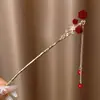 Horquilla de Borla de Flor Roja de Año Nuevo para Mujeres en Otoño e Invierno Nueva Chinoiserie Horquilla de Gama Alta Estilo Antiguo Horquilla de la Dinastía Han Tocado
