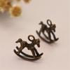 Fábrica de Joyería Yiwu Venta al por mayor Colgante de Colgante de Caballo Mecedora Antiguo DIY Colgante de Pendiente Lindo Material DIY