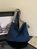 Colección nueva 2026: bolso de mano de alta gama, estilo vintage, de nicho para mujer, con una estética casual y relajada, diseño versátil, construcción ligera y gran capacidad