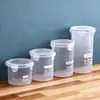Frasco de plástico transparente sellado transfronterizo para almacenar alimentos en el refrigerador, granos de cocina y otros alimentos.