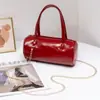 Bolsa de bolinhas 2026 bolsa feminina de nicho novo estilo moderna mini bolsa tiracolo simples bolsa de mão casual bolsa cilíndrica redonda