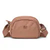 Bolsa Transversal Versátil de Nylon para Viagem e Dia a Dia, Estilo Primavera Tendência, Pequena e Portátil, Design de Concha para Mulheres