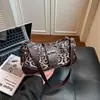 Bolso de axila con estampado de leopardo retro transfronterizo, nuevo diseño de nicho de moda de verano 2026, bolso de mano versátil y elegante