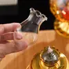 Lámpara de Aceite de Vidrio Cerámico Lámpara de Buda Adornos Chinos Lámparas Chapadas en Oro Queroseno Fuego de Agua Aleación Transfronteriza