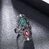 Clásico literario europeo y americano chapado en rubí plata tibetana anillo con tallado simétrico redondo de serpiente explosiones de Amazon A3037