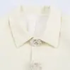 Colección Otoño 2026: Moda femenina transfronteriza europea y americana, con una elegante chaqueta corta con adornos de botones florales tridimensionales, w017 119