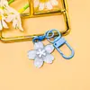 Llavero de Flor de Cerezo Asequible Lindo DIY Pequeños Accesorios Bolsa Accesorios para Muñecas Decoraciones Colgante Venta al por Mayor