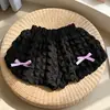 Pantalones cortos de comercio exterior estilo coreano para niñas, pantalones holgados de color caramelo con lazo, pantalones de burbuja waffle de moda