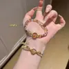 Pulsera de Cristal Natural con Perlas Super Siete de Oro Negro, Nuevo Estilo Chino Lujo Ligero Pulsera Multicapa Hecha a Mano