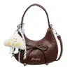 Bolso de mano de color liso en forma de media luna de moda de nicho 2026 nuevo bolso versátil de moda para verano bolso de nicho para mujer para el trabajo