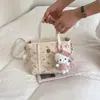 Bolso de Cubo de Mano de Alta Gama para Mujer 2026 Primavera Nuevo Bolso de Hombro con Estampado de Dibujos Animados Diseño de Nicho Bolso para Mujer