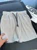 Pantalones cortos de punto a cuadros tipo patchwork estilo americano para hombre, pantalones casuales para deportes al aire libre de verano, corte recto holgado, pantalones cortos de cinco puntos modernos