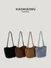 Bolso de cubo tejido de gamuza retro para mujer, versátil para el uso diario, moderno y casual, diseño nuevo, único y elegante