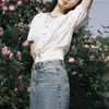 Tricô Retro Doce de Gola V de Manga Curta Ocidental para Mulheres Design de Verão Nicho Cintura Fina Aparência Emagrecedora Cardigã de Seda Gelada