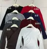 Camiseta Cruzada com Decote V Pure Desire para Mulheres 2025 Nova Camisa Base de Renda Manga Longa Início do Outono Slim Fit Levemente Maduro Sexy