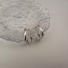 Aretes de moda europea y americana con doble C torcida, aretes de temperamento de alto sentido, aretes de diseño simple y de nicho, joyería al por mayor