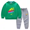 Nova coleção primavera e outono 2023 roupas infantis transfronteiriças suéter infantil calça conjunto de duas peças comércio exterior bebê algodão manga longa terno