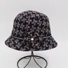 Sombrero para mujer de mediana edad y anciana sombrero de cubo coreano otoño e invierno sombrero de pescador primavera y otoño sombrero de copa de tela informal sombrero de suegra sombrero de suegra