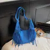 Bolso cruzado de moda retro con flecos de venta caliente transfronteriza para mujer, nuevo diseño de nicho 2026 bolso tipo empanada de gamuza bolso cruzado