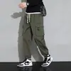 Calças Cargo Outono 2025 Masculinas Esportivas Tamanho Grande Largas Marca Tendência Harem Moda Mais Fácil de Combinar Estilo Coreano Calças Casuais Tendência Jovem
