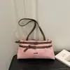 Moda transfronteriza comercio exterior retro simple gran capacidad 2026 nuevo estilo cinturón de cuero moda casual bolso de hombro para mujer