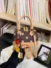 Bolso de mano tipo concha de moda transfronteriza fresco y dulce para mujer, nuevo de otoño 2026, bolso de hombro cruzado de lunares de lujo ligero