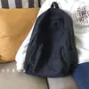 Mochila escolar de lona retrô para estudantes estilo ins feminina mochila versátil para estudantes do ensino médio feminino cor sólida simples mochila de campus masculina