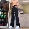 Pantalones de vestir rectos negros con caída de alta gama, Pantalones ligeramente acampanados de seda helada para hombre, Pantalones casuales de traje para exportación de primavera