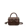Bolso bandolera versátil de alta gama con lazo para mujer, otoño 2026, diseño elegante, bolso de un solo hombro con lazo