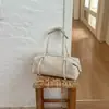 Bolsa feminina de grande capacidade 2026 nova bolsa de ombro casual nicho vintage com toque de alta qualidade para trabalho e deslocamento, bolsa tipo travesseiro