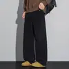 Nuevos pantalones casuales para hombre de otoño e invierno estilo old money con textura jacquard de patrón de bambú, pantalones de pierna ancha de punto semi-elásticos y con caída.