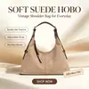 Moda retro versátil diária de alta qualidade de nicho 2026 transfronteiriça bolsa de bolinho bolsa de ombro transversal de grande capacidade