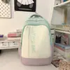 Mini mochila pequeña de bloques de color fresco, versátil para estudiantes universitarios, bolso de mano para mujeres, bolso de mamá, mochila de viaje linda