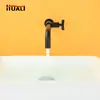 Europa y Estados Unidos transfronterizos todo cobre grifo de lavabo de pared lavabo refrigeración simple gabinete de baño inodoro lavabo de mesa Lavabo