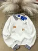 Sudadera con Estampado de Cachorro Estilo Ins Lindo Parcheada Falsa de Dos Piezas para Mujer Invierno 2025 Rejuvenecedora Versátil Top con Cuello Polo