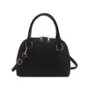 Bolso de Diseño Nicho Estilo Coreano Color Sólido Moderno de Hombro Único Cruzado para Mujer Verano 2026 Bolso Nicho de Concha