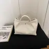 Bolso de Hombro Tejido de Moda Europeo y Americano 2026 Verano Nuevo Casual Gran Capacidad para Viajes Cotidianos Versátil Elegante Versión Coreana para Mujer