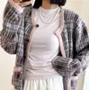 Camiseta de punto de lana hueca sin costuras de manga corta estilo "old money" de alta gama con alta elasticidad en cuatro direcciones top KM548