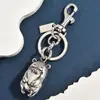 Lindo llavero de oso de metal estilo vintage, accesorio de bolso de nicho de alta gama, colgante de llavero de coche para parejas