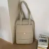Bolsa tote casual de design exclusivo para mulheres, coleção de outono 2026, grande capacidade, cor sólida simples, bolsa de ombro para o dia a dia