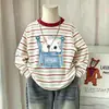 Camiseta de manga larga a rayas de algodón puro para niñas, nueva versión primavera y otoño 2026, estilo coreano, top casual versátil, camiseta básica para niños