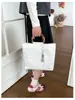 Nueva bolsa de mano de lona con patrón de bambú de plástico, de gran capacidad, hecha a mano, bordada por ambos lados, con relieve dorado, estilo chino, para el trabajo y los desplazamientos.