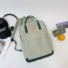 Mochila Escolar para Mujer 2023 Nueva Japonesa ins Mochila Sencilla para Estudiantes de Secundaria Combinación de Colores Ligera Mochila Portátil para Estudiantes Universitarios