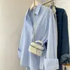 Camisa Estilo Coreano Feminina Primavera Outono 2026 Nova Blusa Pequena Solta Toque de Luxo Manga Longa Top Camisa Branca Jaqueta Feminina Tendência