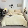 Juego de cuatro piezas de algodón lavado doble de color sólido Ropa de cama estilo Ins Sábanas Cubre edredón Juego de tres piezas para dormitorio de estudiantes Suave y ceroso