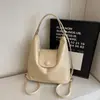 Bolso tote 2026 otoño nuevo modelo mochila de gran capacidad para el trabajo diseño de nicho bolso de hombro para mujer bolso cruzado multiusos