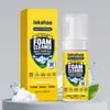 El spray limpiador de espuma multiusos para interiores de coche JAKEHOE disuelve el polvo y las manchas de grasa del tablero, los asientos y el revestimiento del techo.