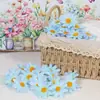 Flores Sueltas Más Vendidas Transfronterizas en Stock Cabeza de Margarita Pequeña Simulada Flor de Girasol Cabezas de Flores de Seda para Manualidades Accesorios para el Cabello Flores de Girasol